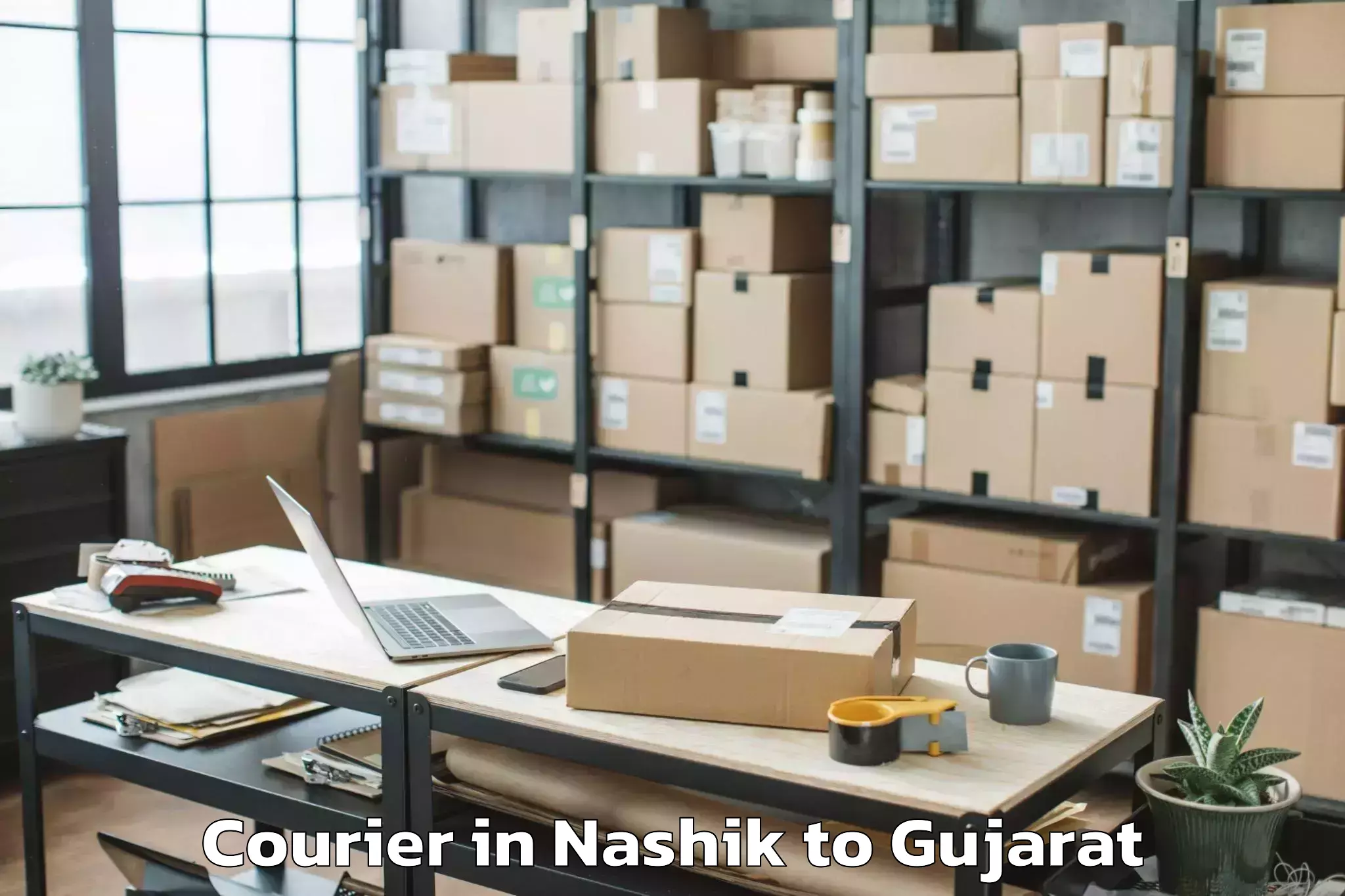 Reliable Nashik to Dhuvaran Courier